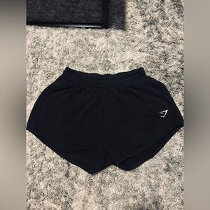 gymshark black sweat shorts 
size M